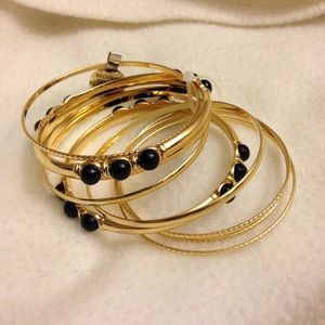 Gold and black bangle set bracelet