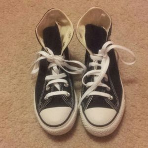 Black high-top Converse/Chuck Taylor's