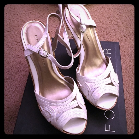 Brand new Wedge shoes. Still in its original box.