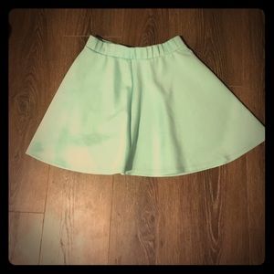 Turquoise dance skirt.
