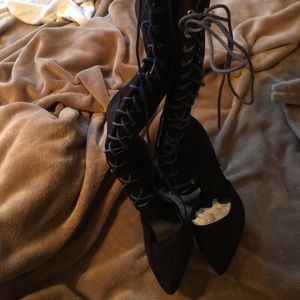 Black suede high heel boots