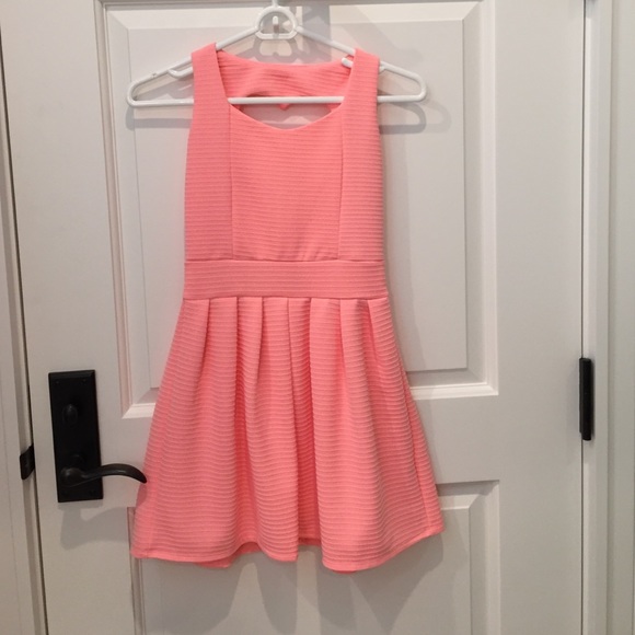 Pink dress with heart shaped hole on the back