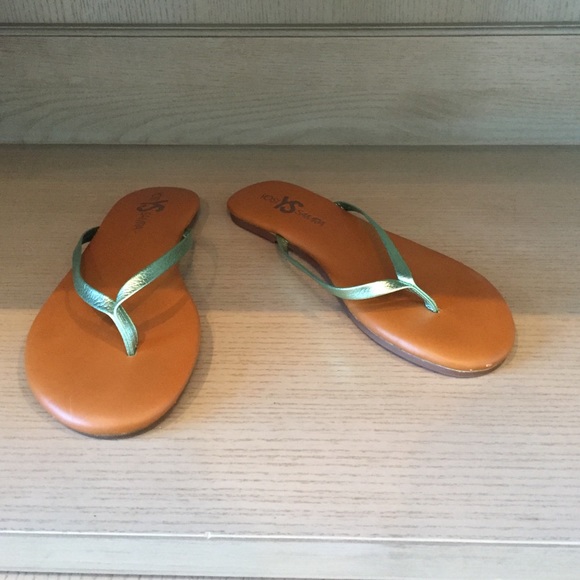 Green and brown flip flops