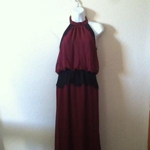 Wine color dress.