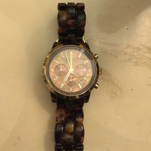 Michael Kors tortoise watch.