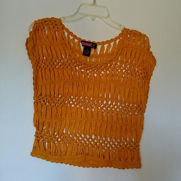 Over a tank top shirt
