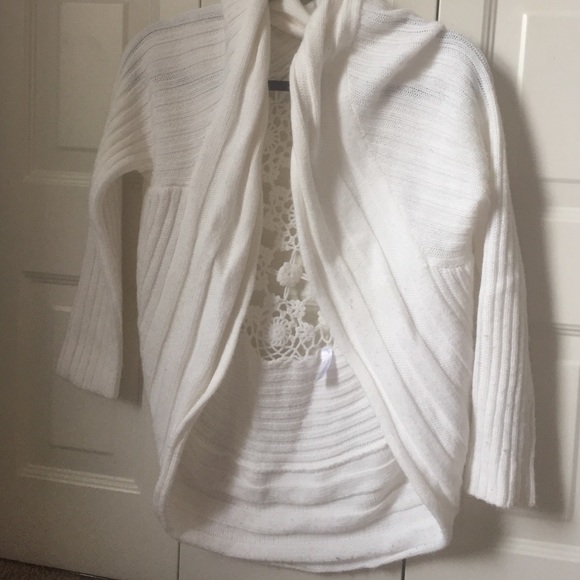 white cardigan sweater with lace-like back