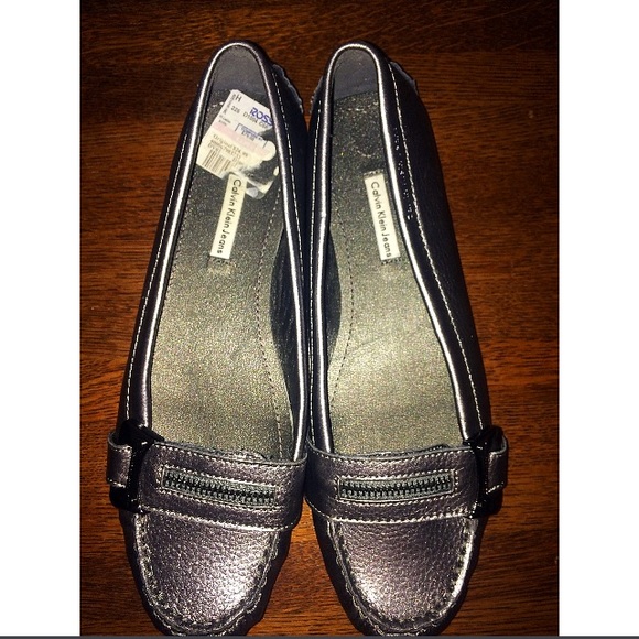 Calvin Klein Loafers/Flats in Metallic Silver