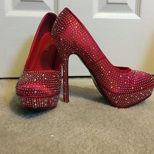 Red gemmed heels