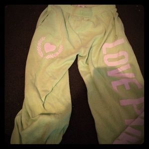 Lime green capri sweatpants.