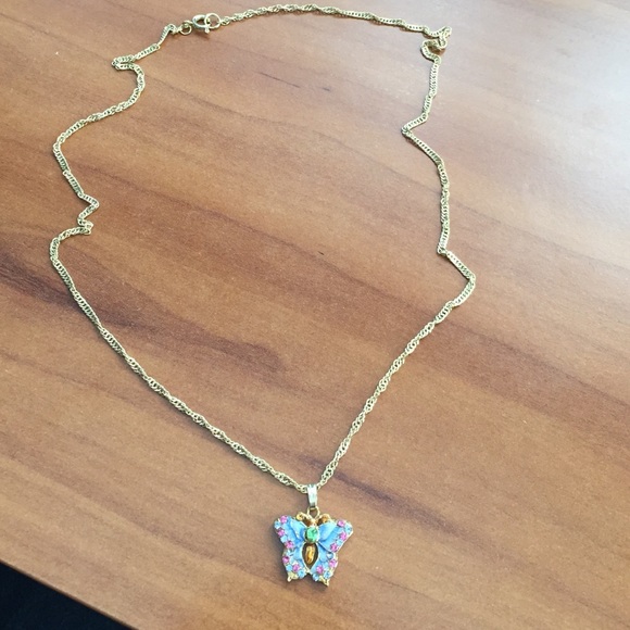 Butterfly necklace on gold chain