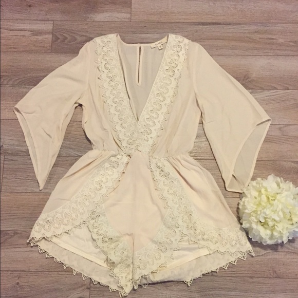 Cream romper S,M,L available