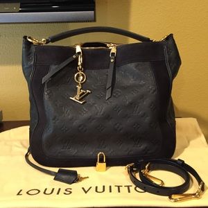 Luis Vuitton Audacieuse MM monogram and suede