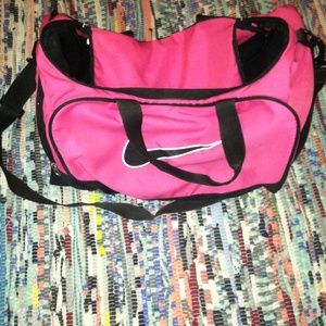 Pink NIKE small duffle bag