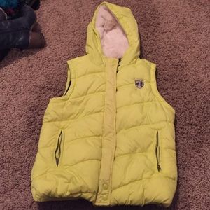 Bright yellow puffy vest