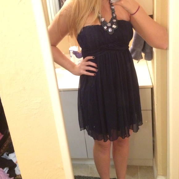 Beautiful jeweled blue dress by Jodi Kristopher