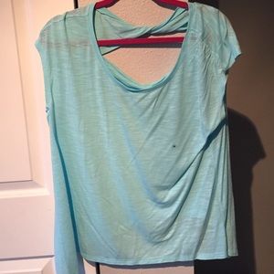 Light blue open back shirt