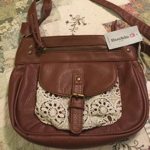 Buckle T-shirt & Jeans cross body.