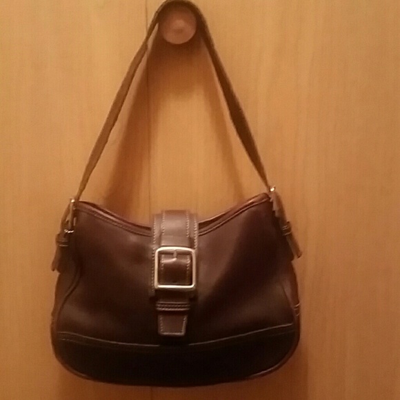 Brown leather Coach bag.