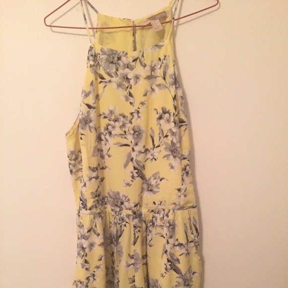 A yellow and white floral Romper| Forever 21