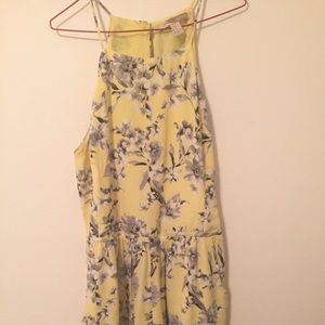 A yellow and white floral Romper| Forever 21