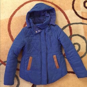 blue puffer jacket