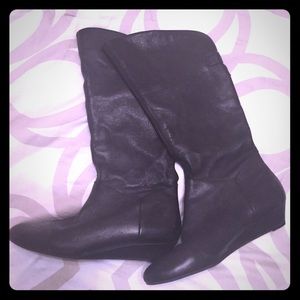 Black boots with silver buckle