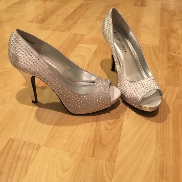 NEW silver open toe heels.