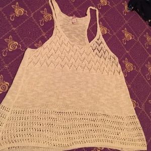 A cream strap top