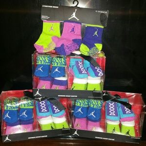 Jordan infant bootie sets and 3 pairs of socks
