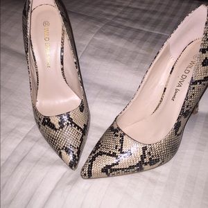 Snakeskin pumps