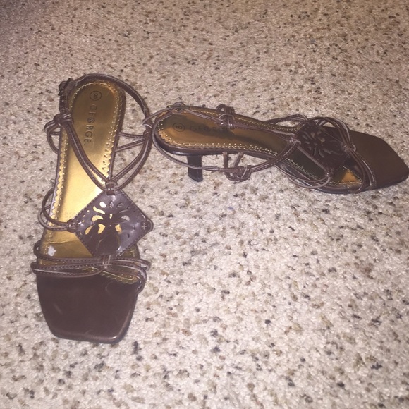 Brown heeled buckle shoes