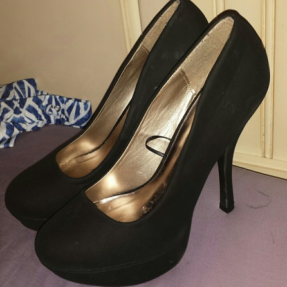 Black high heels.