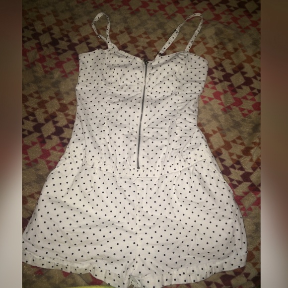 White romper with black polka dots