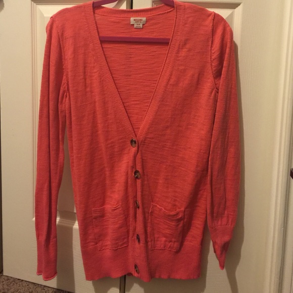 Cardigan , nice peachy pink color .