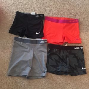 Four Nike pro spandex shorts