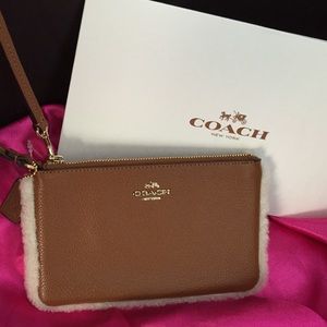 Coach Brown Faux Fur Trimmed Cluth