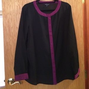 Black button down shirt with purple trim.