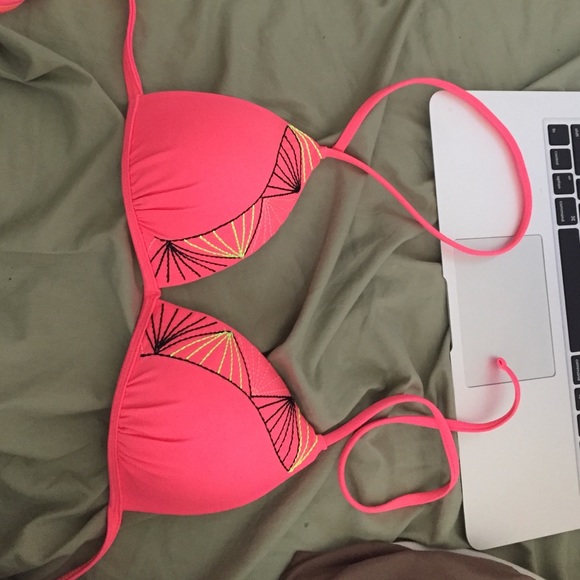 bathing suit top with black and neon design