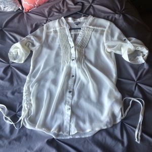 Vanity sheer cream colored blouse.