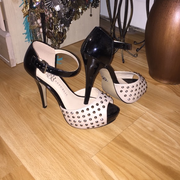 Black and nude peep toe heels with silver studs