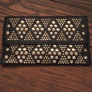 Leather black clutch w/ gold studs and rhinestone
