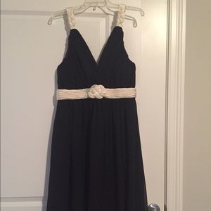 Black evening gown with decorative trim