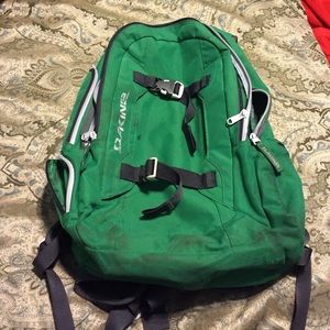 Green Dakine backpack.
