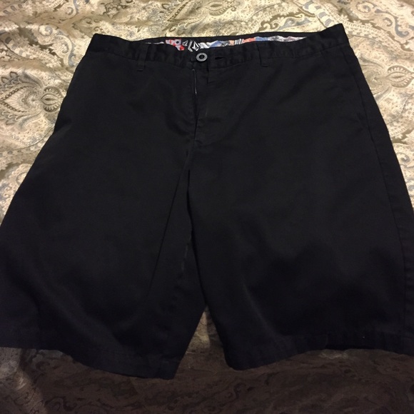 Black Volcom shorts.