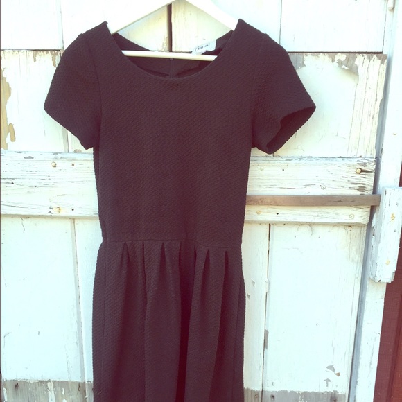 Form fitting little black dress