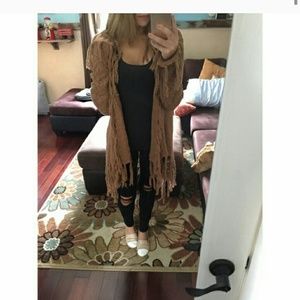 Long, light brown, fringe duster