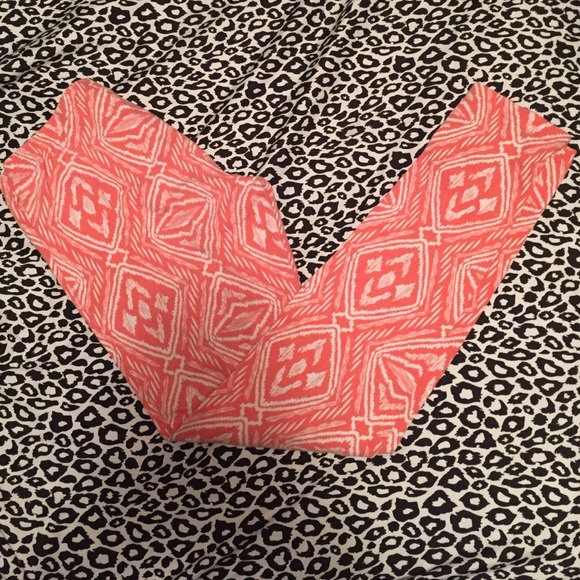 Orange and white designed leggings