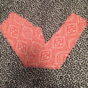 Orange and white designed leggings