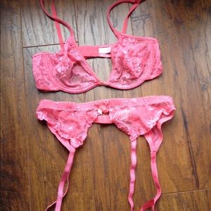 Victoria's Secret coral bra and garter set.